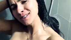 Busty curly brunette with big boobs fucks on couch